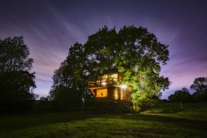 Nighttime exterior of The Old Oak at Colemans Farm